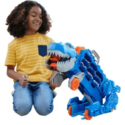 Hot Wheels City Camión tráiler Camión que se transforma en Tiranosaurio Rex pisoteador con pista de