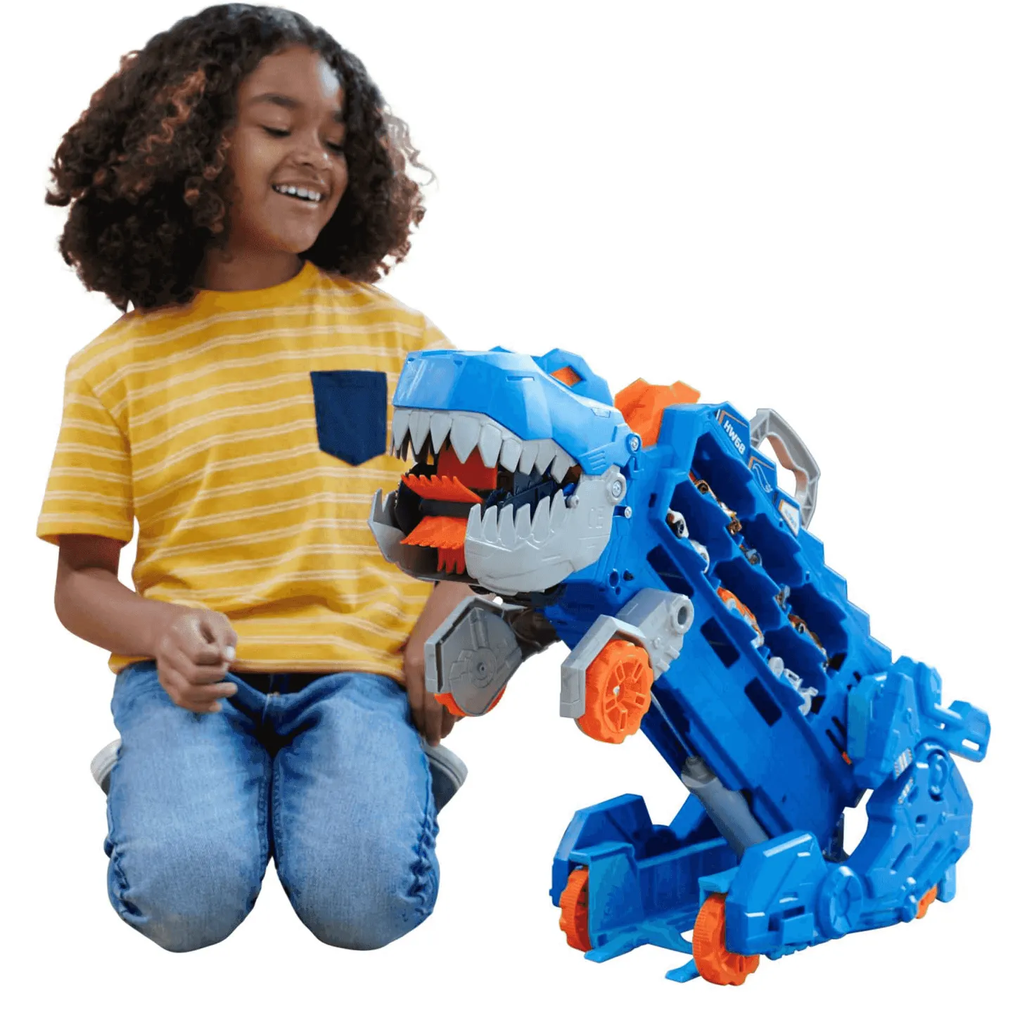 Hot Wheels City Camión tráiler Camión que se transforma en Tiranosaurio Rex pisoteador con pista de