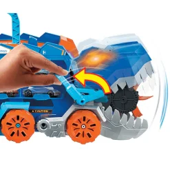 Hot Wheels City Camión tráiler Camión que se transforma en Tiranosaurio Rex pisoteador con pista de